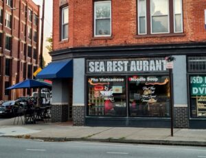 View from the street of SEA Restaurant in a brick building on the corner of Monroe Ave in Rochester NY