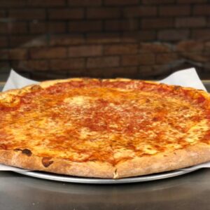 A freshly cooked and sliced cheese pizza at Joe's Brooklyn Pizza in Rochester NY