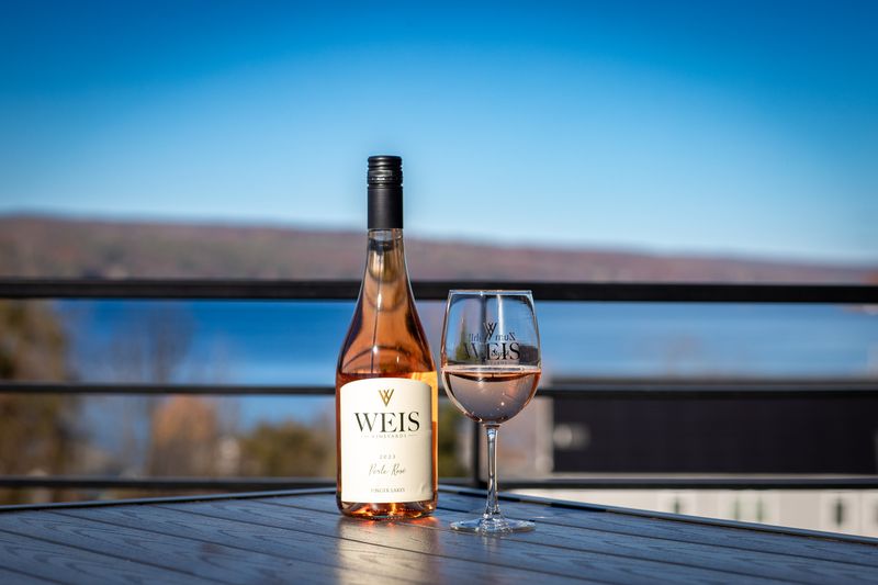 A bottle and glass of wine from Weis Vineyards, on the Keuka Wine Trail in the Finger Lakes region of NY