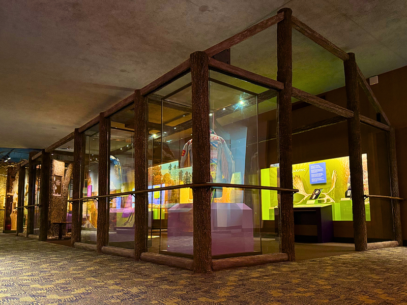 A glass longhouse that holds several pieces in the Hodinöšyö:nih exhibit at the Rochester Museum of Science in Rochester, NY.