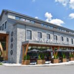 Daytime view of the stone building housing the New York Beer Project in Victor NY