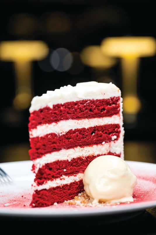 Red velvet coconut cake with vanilla crème fraîche ice cream at Patron Saint in Rochester, N.Y.