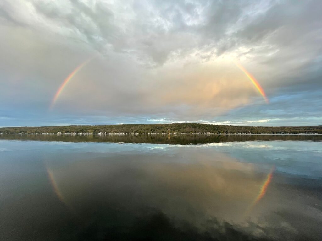 Rainbow captured over Conesus Lake by Wendy Stopinski.