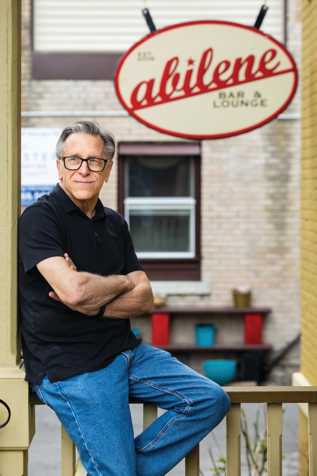 Danny Deutsch poses in front of Abilene Bar & Lounge in Rochester, N.Y.