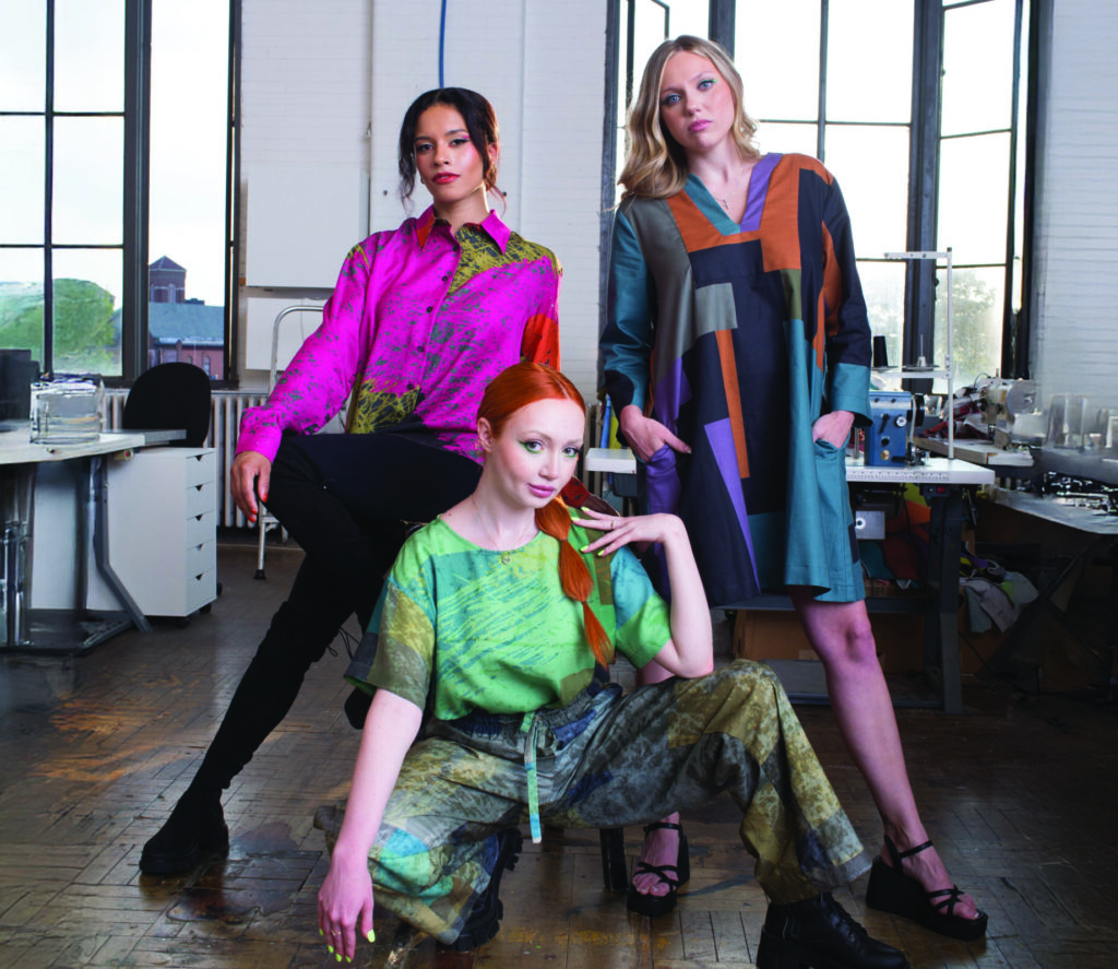 Models Eustacia Garrison, Jade Metzger, and Liliia Ozturk posing in Andrea Geer's Rochester studio.
