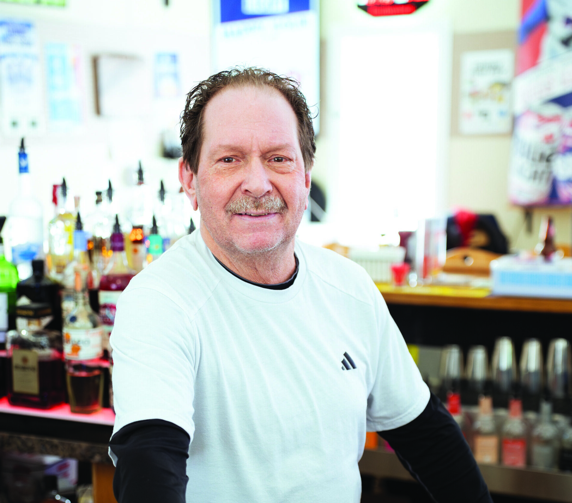 Wayne Cole behind the bar at Mike’s Ridge Terrace Pub & Grill in Webster, NY.